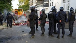 macron-vows-justice-for-slain-paris-teen